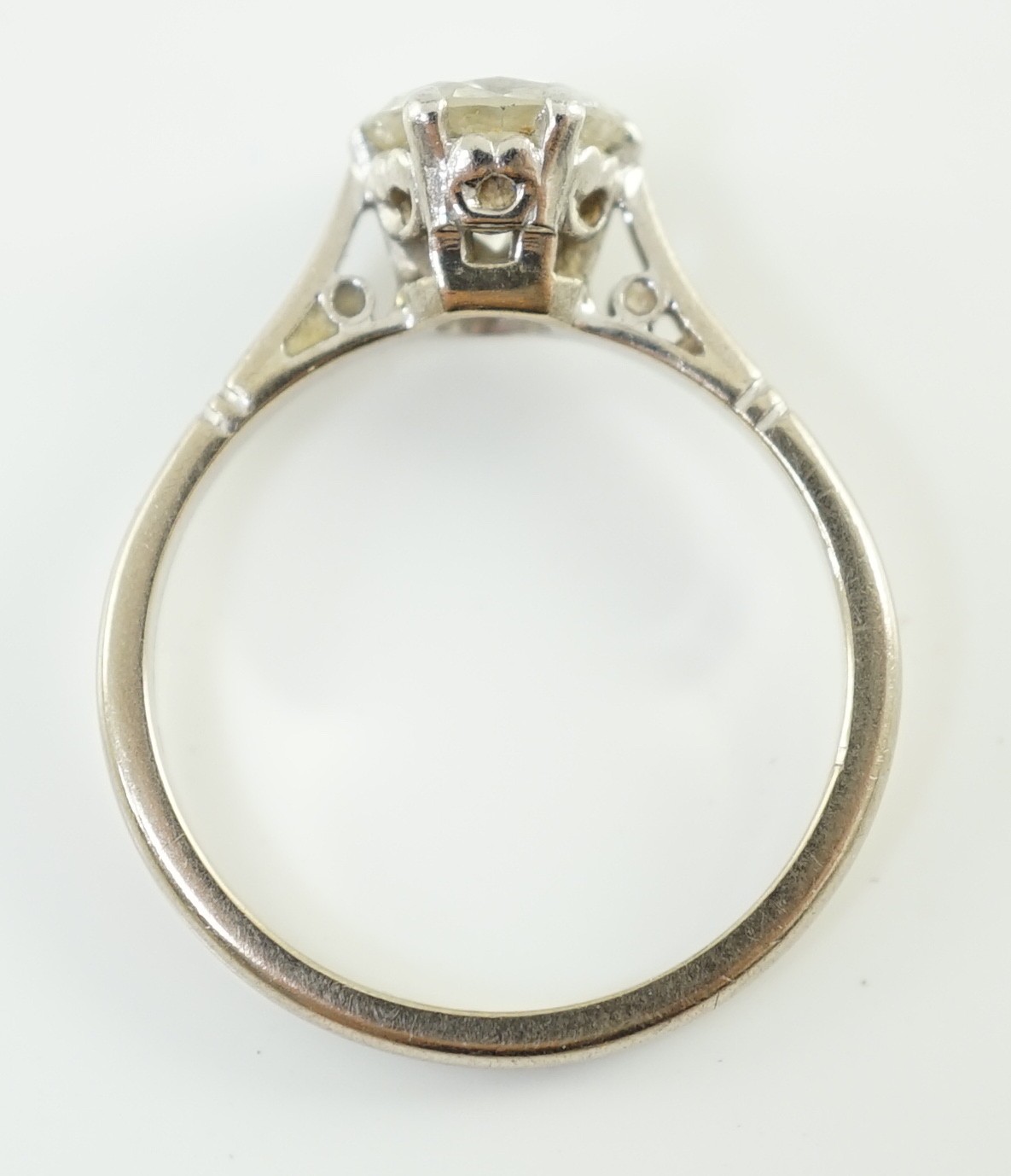 An 18ct white gold, platinum and solitaire diamond set ring